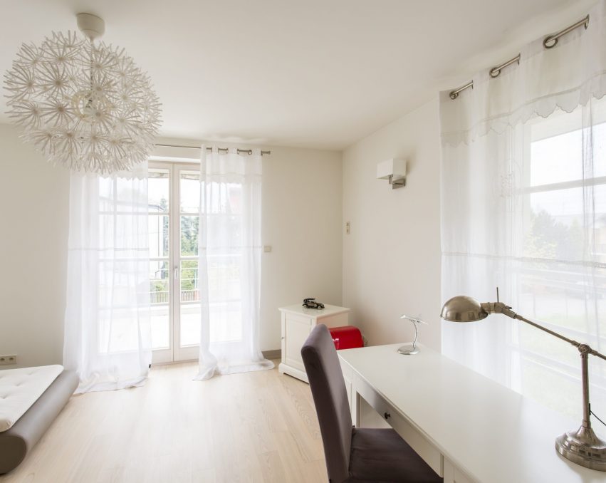 modern-interior-with-sofa-and-desk-PJEQUHT-scaled.jpg